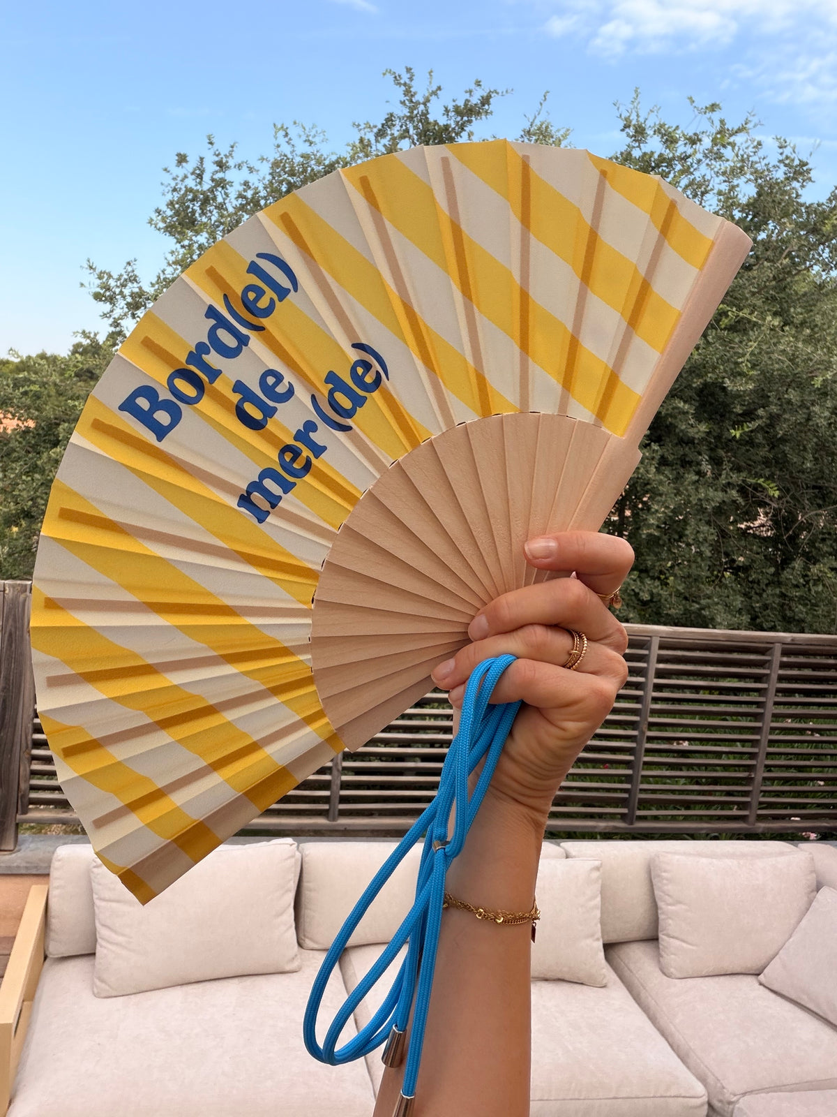Éventail coloré à message avec bandoulière