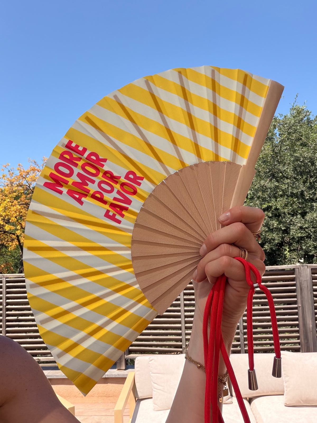 Éventail coloré à message avec bandoulière