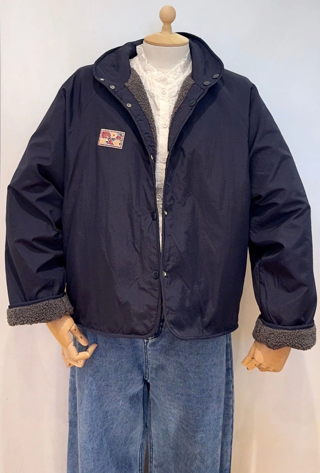 Veste matelassée réversible Sherpa AMÉLIE Bleu marine / Gris