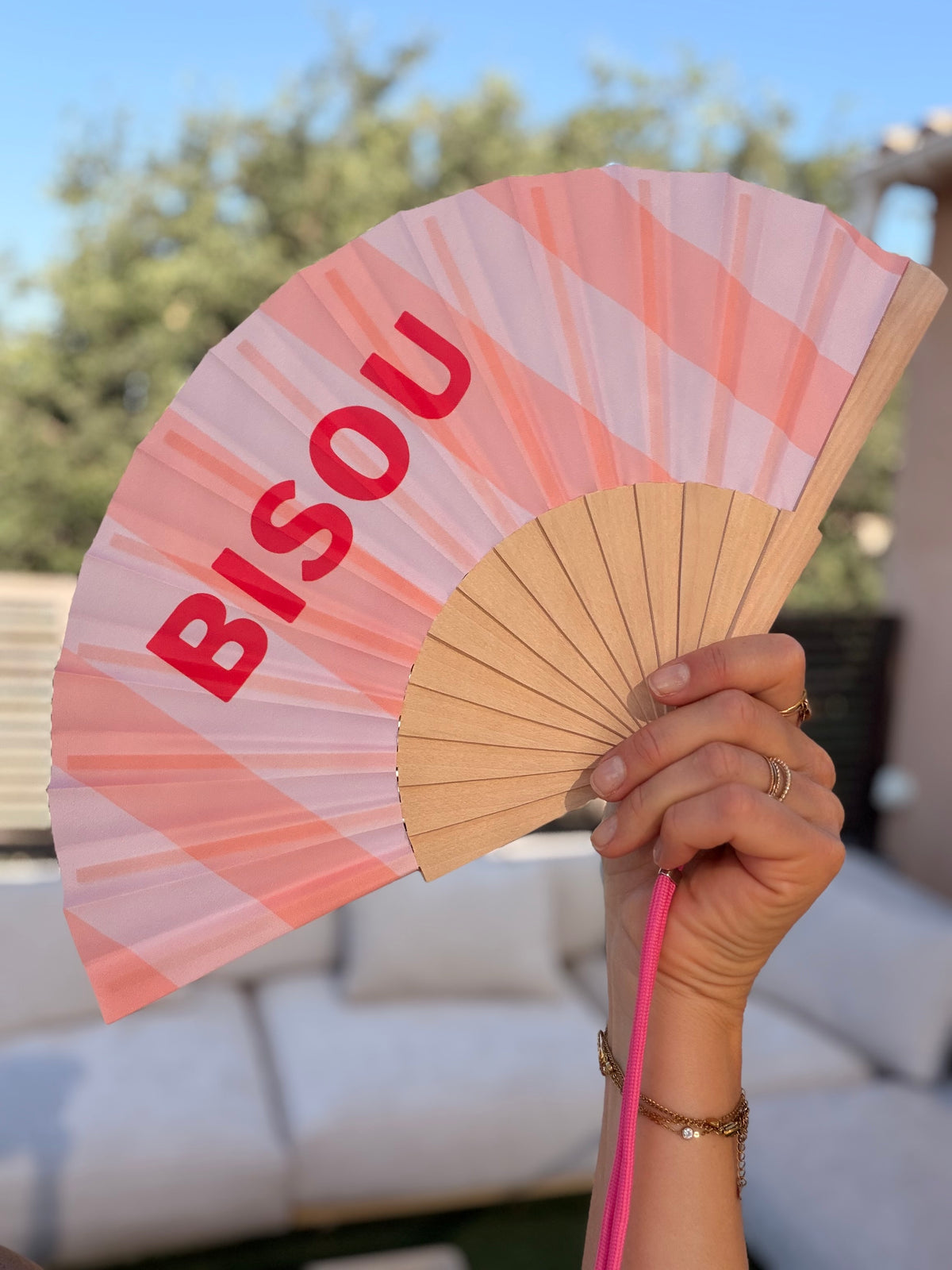 Éventail coloré à message avec bandoulière
